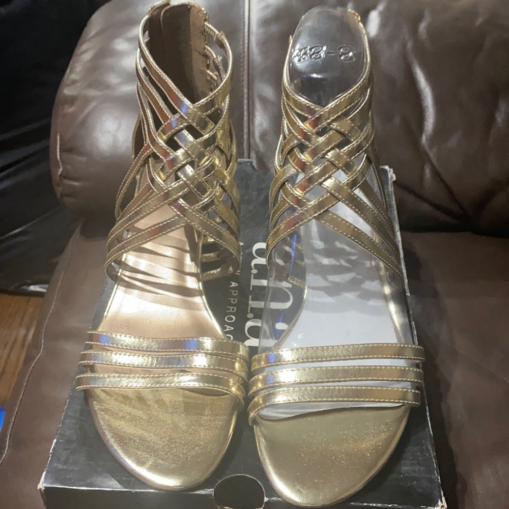 New gold sandal never worn damaged box
